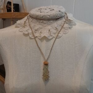 Elegant Beige Necklace with Gemstone Pendant